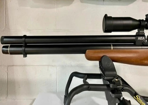 Rugged Carbon Fiber PA12 CF15 Barrel Band For AEA Challenger And Bullpup.50 Cal Shrouded, mounted on a firearm.