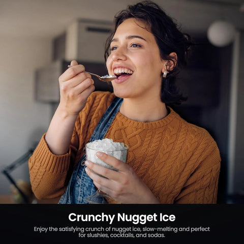 Kismile Nugget Ice Maker countertop appliance, silver finish; person enjoys crushed ice in a glass