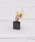 Two Pack Motor Carbon Brushes 1313113 top view of carbon brush with spring and connector for Delta and Porter Cable tools.