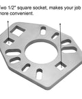 Stainless steel pinion yoke wrench tool base plate with large central hole and multiple slots for yokes and axles