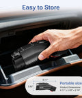 Hand placing Heavy Duty Nacs To J1772 Electric Vehicle Charging Adapter For Tesla 60A 250V in car glove compartment.