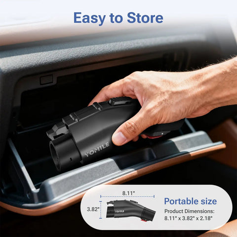 Hand placing Heavy Duty Nacs To J1772 Electric Vehicle Charging Adapter For Tesla 60A 250V in car glove compartment.