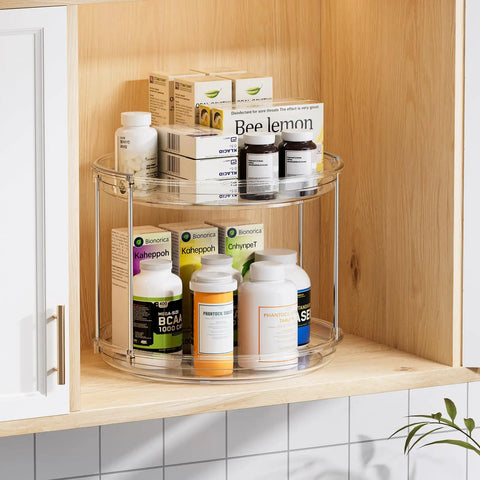 2 Tier Lazy Susan Turntable Organizer For Narrow Cabinets in a wooden shelf, holding supplements and medicine bottles.