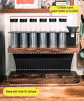 Two Tier Coffee Tool Storage Stand With Twelve Single Dose Bean Vials And One Way Exhaust Valve Plus Heavy Duty Slots For Tamper And Dosing Cups. Displaying twelve vials and tamper holder.