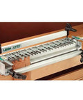 Top Shelf 24 Inch Dovetail Jig With One Piece Aluminum Base Crafts Authentic Hand Cut Woodworking Pins Tails on workbench.