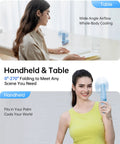 Woman using Power Bank Handheld Fan With 4500mAh Battery Folding Personal Fan for USB Or Battery Power 3 Speeds Ultra Portable