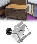 Heavy Duty 90 Degree Corner Clamp With Super Sturdy Grip For Woodworking Welding And Framing Jobs One Hand Operation Stainless Steel Workhorse displayed near a bedside drawer.