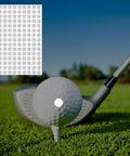 300 Pack White Reflective Dot Stickers For Golf Balls And Clubs, Tiny 0.65 Cm Dots, shown on a golf ball on grass tee and club