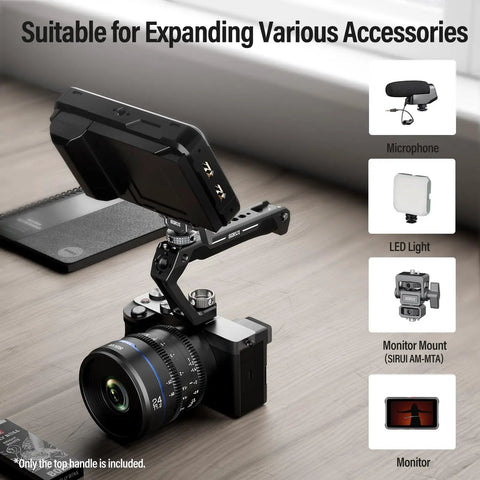Universal Camera Cage Top Handle With Cold Shoe Mount attached to a camera, showing accessory compatibility on desk setup.