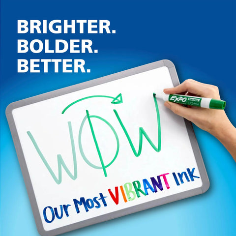 Hand writes 'WOW' and 'Our Most VIBRANT Ink' on whiteboard using Low Odor Dry Erase Markers With Vibrant Ink And Chisel Tip 16 Count.