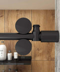 Close-up of the black barn style hardware from the 5 Foot Frameless Black Sliding Glass Shower Door Running Track system in a bathroom.