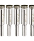Five 11mm diamond tile drill bits with silver shanks.