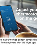 Person using a smartphone to control Smart WiFi Thermostat With App Control For Alexa And Google Assistant, No-Fuss DIY Install In Under 30 Minutes.