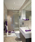 Bathroom with modern design featuring Infrared Ceiling Heater With Fan For Bathroom, Single Bulb, White Finish, Instant Warmth Without Cranking The Thermostat, Energy Efficient 250W R40 BR40 Bulb Not Included, Quiet Ventilation And Quick Heat installed in the ceiling.