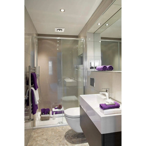 Bathroom with modern design featuring Infrared Ceiling Heater With Fan For Bathroom, Single Bulb, White Finish, Instant Warmth Without Cranking The Thermostat, Energy Efficient 250W R40 BR40 Bulb Not Included, Quiet Ventilation And Quick Heat installed in the ceiling.