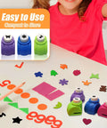 Child using 12 Piece Craft Hole Punch Shapes Set for Scrapbooking and Card Making Mini Paper Punchers, assorted colors on table