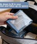 Compact Portable Washing Bag For Camping And Road Trips, Lightweight Manual Hand Wash Sack With Built In Scrub Sleeve, Ditch The Laundromat Hustle And Crush Stains Effortlessly On The Go in hand, fitting in a backpack.