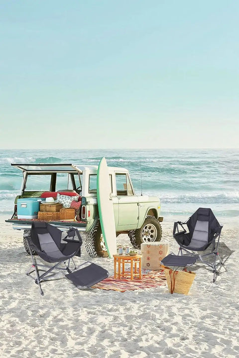 Ultimate Outdoor Hammock Chair With Removable Footrest And Stand on beach with surfboard and picnic setup