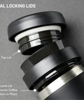 Close-up of dual locking lids for Ultralight Travel French Press Coffee Maker For On The Go Brews, Vacuum Insulated Stainless Steel 16 Ounce Capacity, Matte Meteorite Black, Ideal For Camping, Commuting, Or Office Breaks.