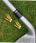 Straight Up Solid Universal Brass Golf Shaft Shim Set Five Piece Kit beside a golf club on grass, showcasing alignment tool usage.