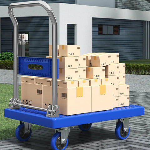 Rock Solid Heavy Duty Folding Platform Truck Rated For One Hundred Fifty Kilos with stacked boxes on durable blue platform.