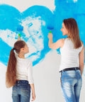 Two people painting a wall with 2 Inch Mini Foam Paint Roller Kit With Frame And Tray Refills Included Perfect For Small Touch Ups
