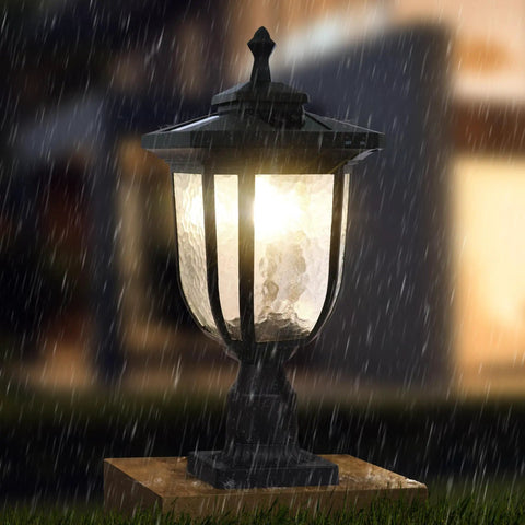 Solar Powered LED Post Light 180 Lumen Die Cast Aluminum Black Finish 3 Inch Fitter Base Pier Mount in rainy garden setting