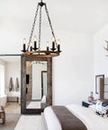 Farmhouse Wagon Wheel Chandelier With 6 Lights Industrial Round Candelabra Pendant Light Fixture in rustic bedroom