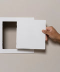 Eight By Eight Inch White Access Panel For Plumbing And Electrical Cables shown being installed into drywall.