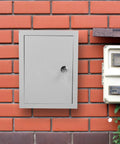 Weatherproof Outdoor Electrical Junction Box Metal Enclosure 300x400x160mm with Mounting Brackets installed on brick wall