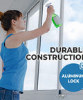 Woman cleaning window with Aluminum Thumb Turn Window Locks 4 Pack For Sliding Windows And Doors No Drill Install Kid Safe