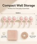 Hassle Free Peel And Stick Wall Hooks With Six Swiveling Rotating Arms For Hanging Bath Towels Kitchen Tools And Daily Gear Directly On Any Smooth Surface, featuring pink hooks.