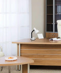 Basic Metal Desk Lamp With Flexible Hose Neck In White Finish on a wooden office desk in a modern room
