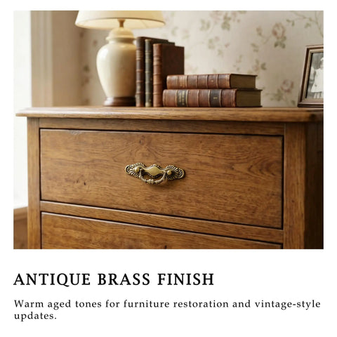 4 Pack Antique Brass Bail Drawer Pulls With 2-1/2 Inch Center Spacing on wooden dresser with retro decor