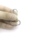 Heavy Duty Silver Swivel Lobster Clasps One Inch Metal Snap Hooks in hand, showcasing solid lock swivel design for bags.