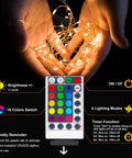 Big 39 Feet 120 LED Battery Powered Fairy Lights With Remote And Timer, RGB Color Changing String Lights in hands with remote