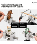 Totally Portable Nifty Mini Table Vise With Quick Swap Clamp holding various items for engraving, painting, and polishing work.
