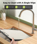 Two In One Titanium Cutting Board Heavy Duty Dual Sided Kitchen Tool being rinsed under faucet, easy to clean surface