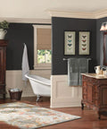 Weymouth 24-Inch Single Towel Bar In Chrome in elegant bathroom, showcasing classic decor and corrosion-resistant mount.