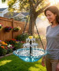 Woman in garden holding Solar Cascade Hanging Bird Bath Fountain With 3 Layer Design For Outdoor Gardens And Ponds 6 Nozzles