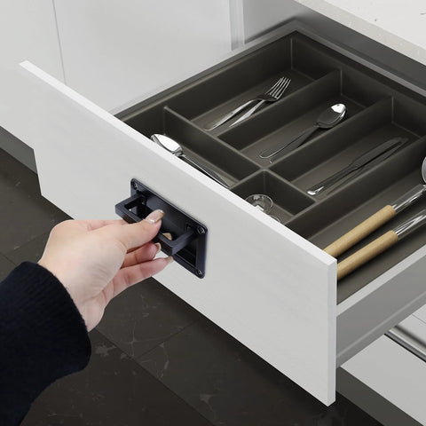 Person pulling a drawer using Spring Loaded Lifting Ring Pull Handle Stainless Steel Flush Mount Boat Hatch Pull With Mounting Screws