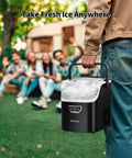Person holding Nugget Ice Maker With Handle, 40 Lbs Per Day, Countertop Ice Maker Ready In 5 Minutes, Soft Sonic Ice outdoors.