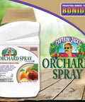Captain Jack's Orchard Spray bottle on wooden table with product label and logo, 32 oz concentrate for garden pest control.