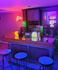 Bar with neon signs, including Back To The Arcade Neon Sign 17 By 14 Inch Bright Glass Tube Lamps Handmade For Bar Pub Man Cave Beer Lovers Decor 110 240 Volt Worldwide Power Cord Included.