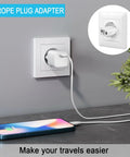 Six Pack US To Europe Type C Travel Plug Adapters in European outlet powering a phone, highlighting compact travel gear