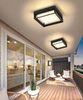 Square Flush Mount Outdoor LED Ceiling Light Fixture 9 Inch 120V 24W 3000K Black Waterproof For Wet Areas Porch Patio Coastal Ready Rust Resistant Aluminum And PC Shade installed on patio ceiling