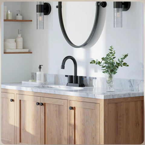 Matte Black 4 Inch Centerset Two Handle Bathroom Faucet With 360 Degree Swivel Spout For Two Or Three Hole Vanities installed on a marble vanity top.
