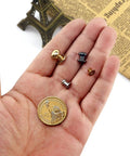 Badass Chicago Screws And Button Head Stud Rivets Sweet Top Tier Fasteners For Leathercraft Diy Crafts Featuring 50 Black Zinc Alloy Pieces with assorted sizes shown in hand.
