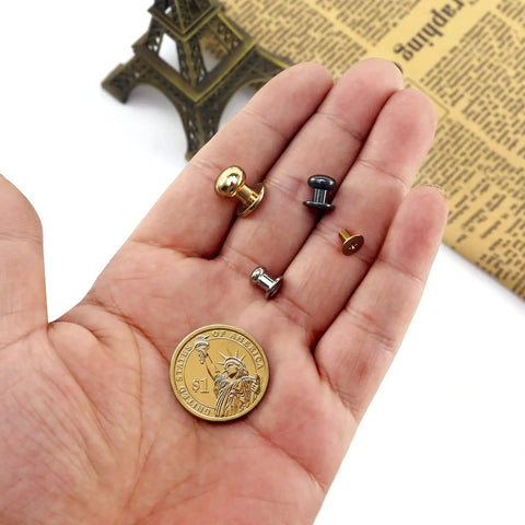 Badass Chicago Screws And Button Head Stud Rivets Sweet Top Tier Fasteners For Leathercraft Diy Crafts Featuring 50 Black Zinc Alloy Pieces with assorted sizes shown in hand.