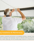 Person installing Eolis 3D WireFree RTS Wind Sensor For Awnings, Wireless Auto Retraction, Off White Finish